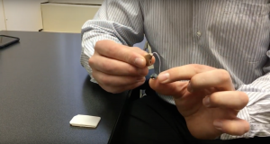 Scott Hyde demonstrating how a hearing device filter