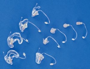 Various examples of earmold receivers
