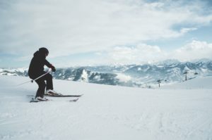 Man wearing a hearing aid while skiing