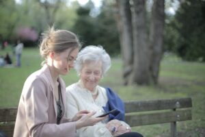 woman talking to elderly