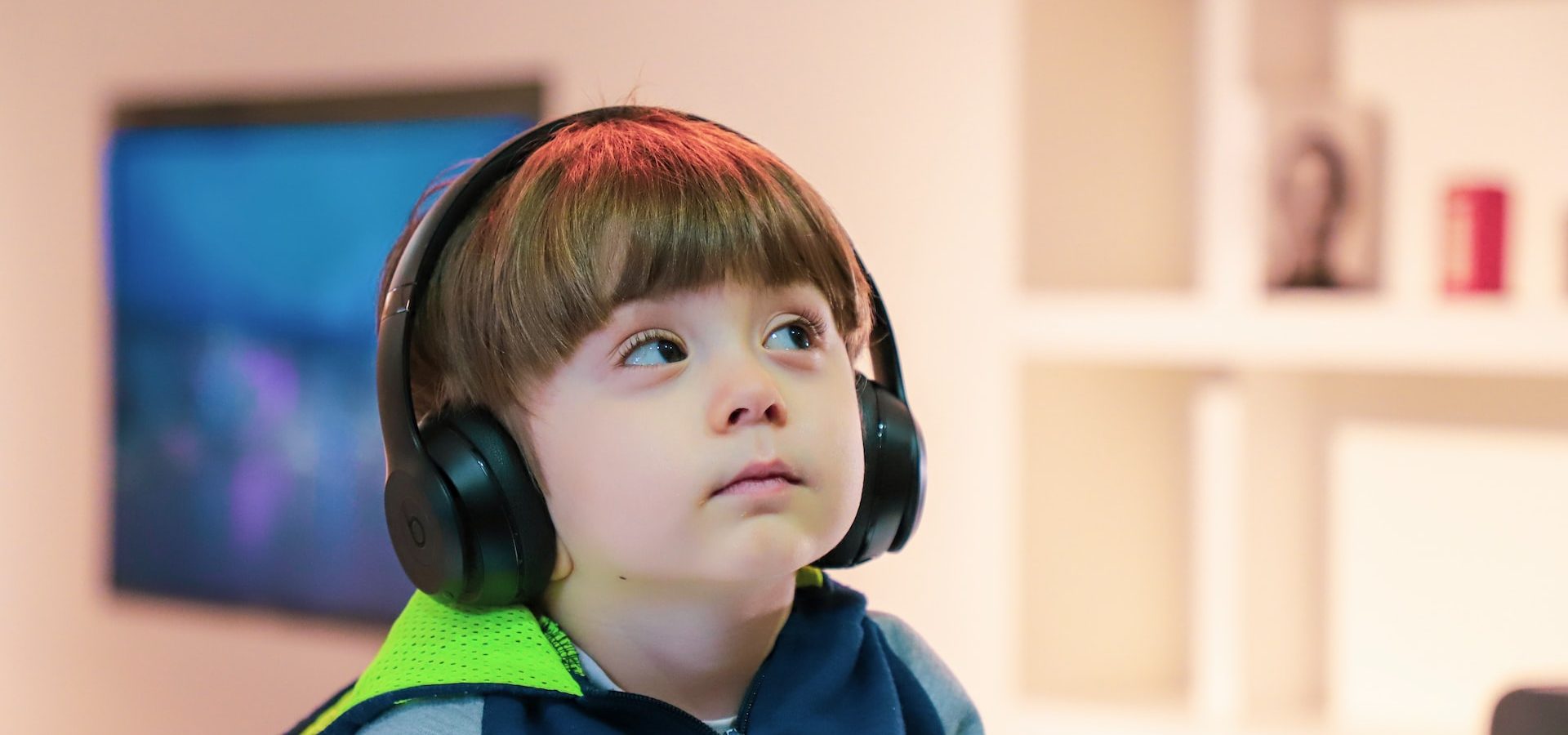 kid wearing headphones