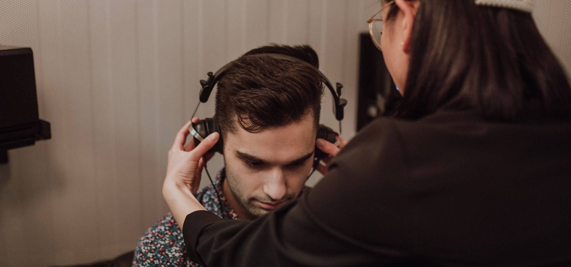 Young man receiving his annual hearing test at Beltone Hearing Center in Langley