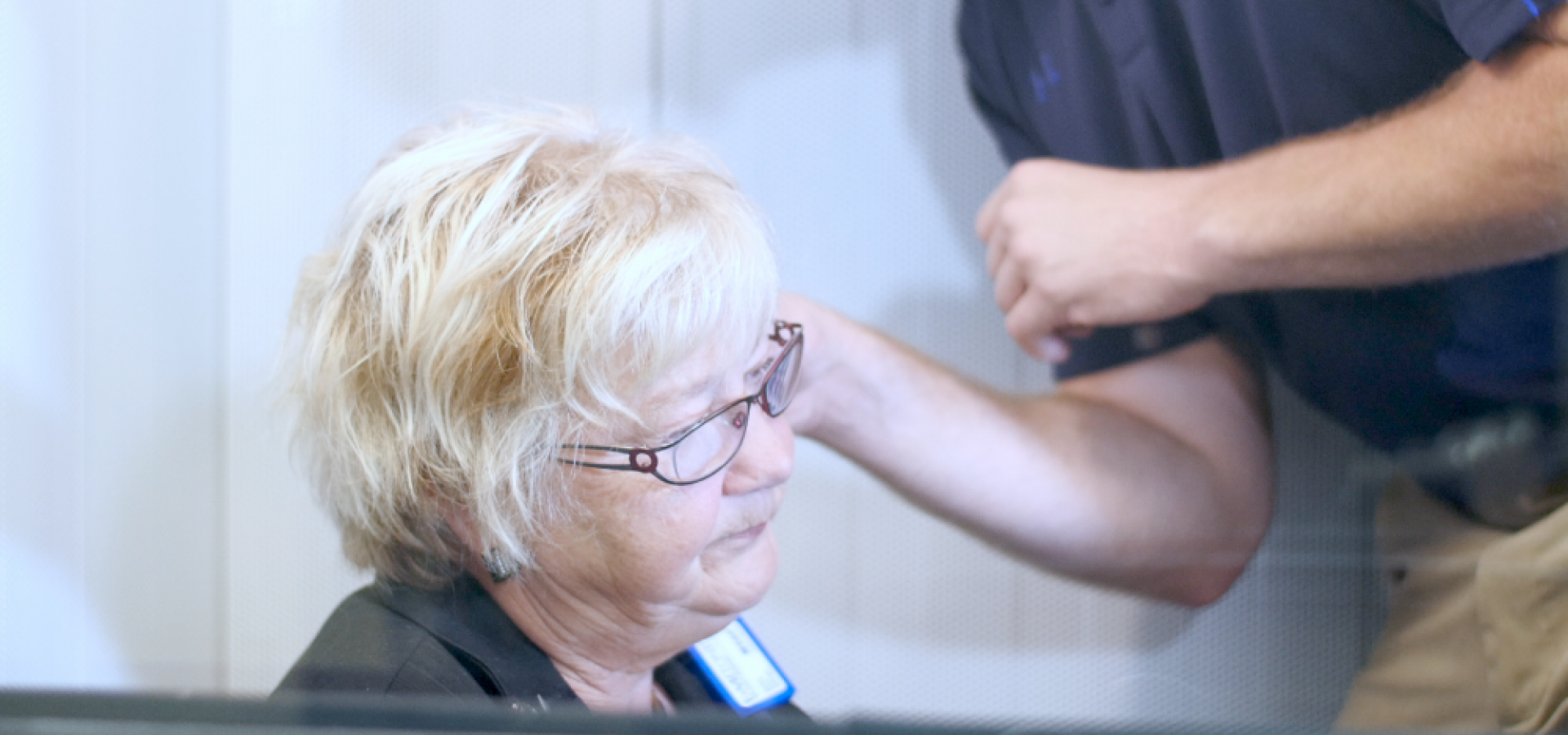 Woman receiving a free hearing test at the Abbotsford Beltone Hearing Centre location