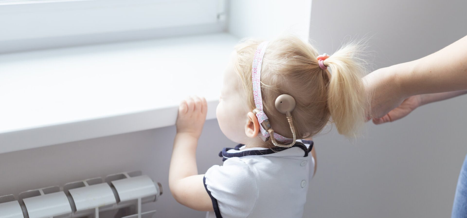 child wearing hearing aid
